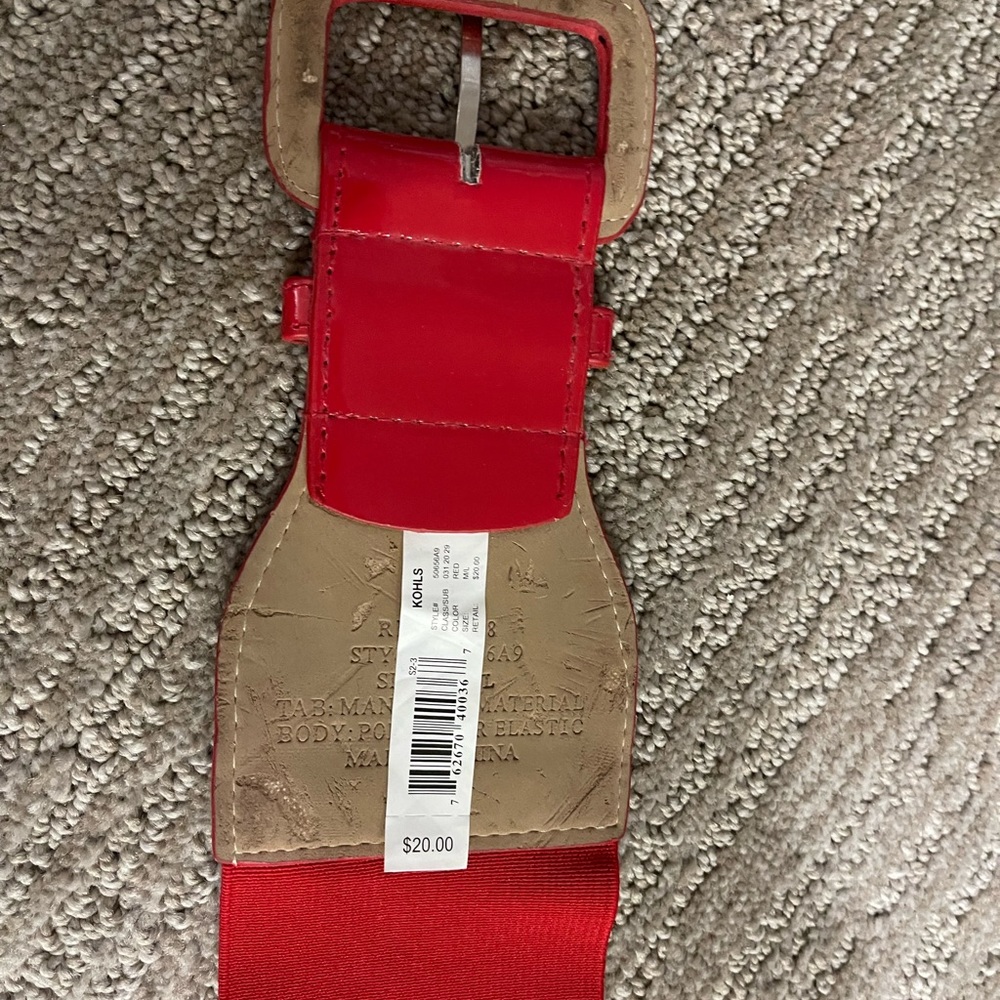 Red elastic and glossy belt.
